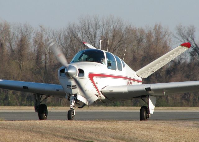 Beechcraft 35 Bonanza (N317B) - 1956 Beech G35 taxiing to 14 at Downtown Shreveport.