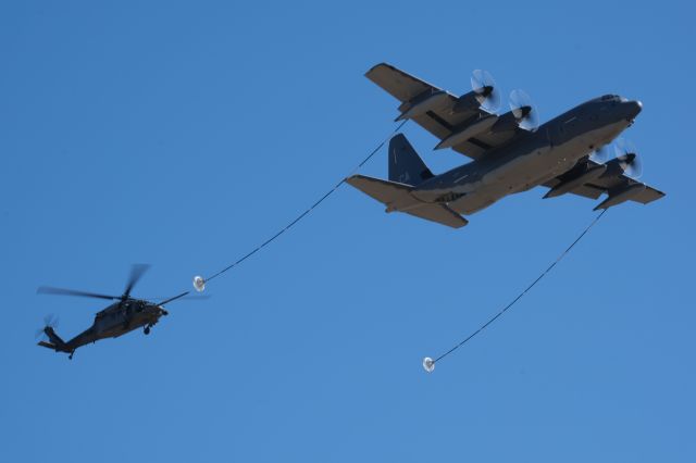 Lockheed C-130 Hercules (SIKORSKY) - Demonstration of Special Operations. HH-60G carrying USAF Pararescue airmen hits the tanker nip of a C-130 at approximately 1,000ft AGL. Low level stuff my 172 hides from.