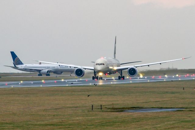 BOEING 787-10 Dreamliner (A6-BMB) - ETD16 starting the take-off roll on the flight back to AUH. First visit of this particular aircraft to Manchester.  N12114 in the background.