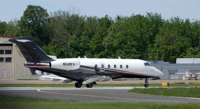 Bombardier Challenger 300 (N549FX) - On the active runway for departure is this 2012 Bombardier Challenger BD-100-1A10 in the Spring of 2019.