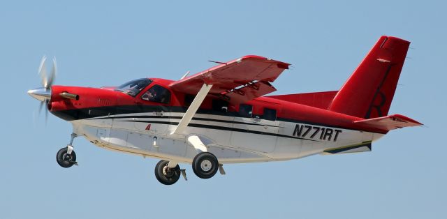 Quest Kodiak (N771RT) - A Red Tail Air company Kodiak 100 (N771RT) climbs away from Reno Tahoe International with a plane load of happy passengers enroute to the Burning Man festival in the Black Rock Desert near Gerlach, NV.