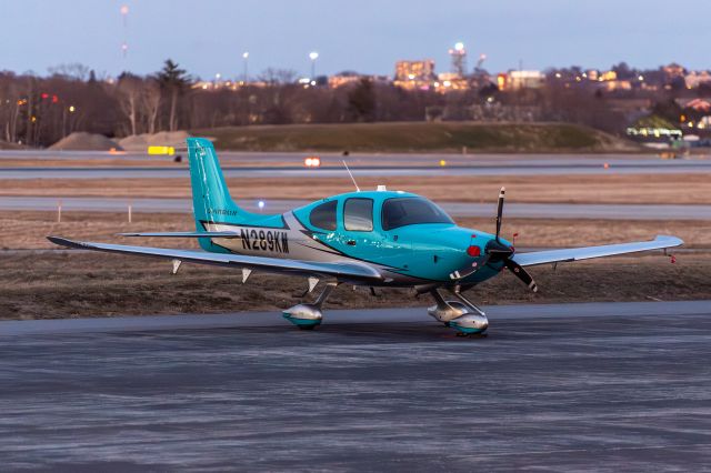 Cirrus SR-20 (N289KM) - As seen on MAC Jets FBO apron from the designated spotting area. Shot was taken in early evening. 