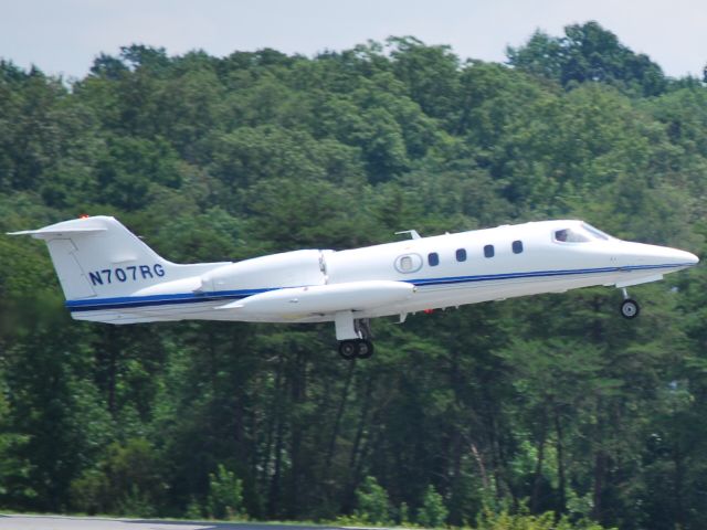 Learjet 35 (N707RG) - Departing from runway 20 at KJQF - 7/22/09