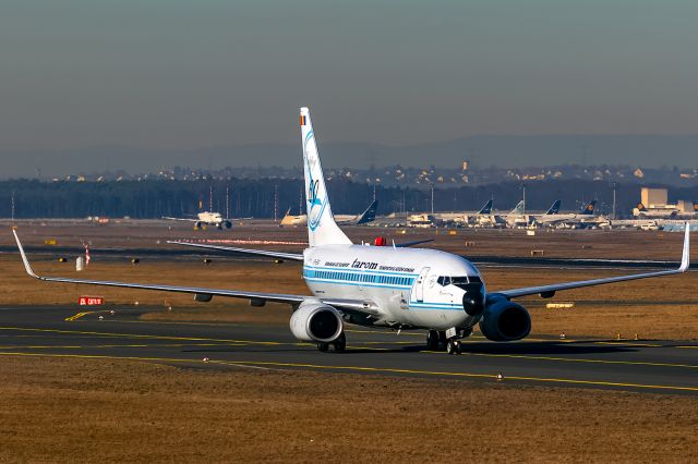 Boeing 737-700 (YR-BGG) - early morning sun