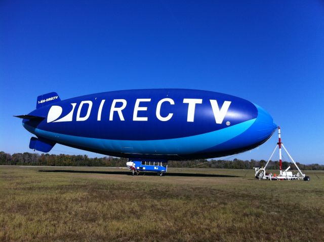 — — - DirecTV Blimp parked at Tampa Executive Airport just before a Bucs game.