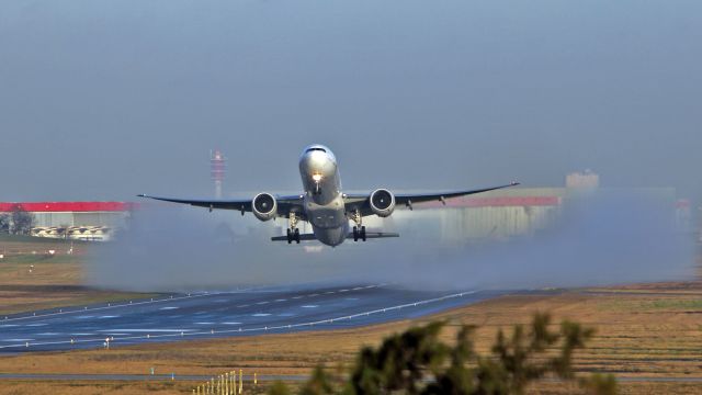 BOEING 777-300 (F-GSQN) - Take off from runway 24/06.Overview bridge of RN7 mainroad.