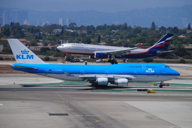 Boeing 747-400 (domestic, no winglets) (PH-BFR) - As the city of Rio de Janeiro awaits departure from 24L, an Aeroflot A332 arrives 24R!