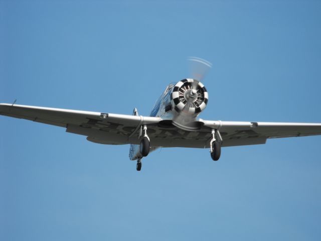 North American T-6 Texan — - The Honda Generators T-6 that was flying with Aeroshell landing RWY9 at Sun N Fun