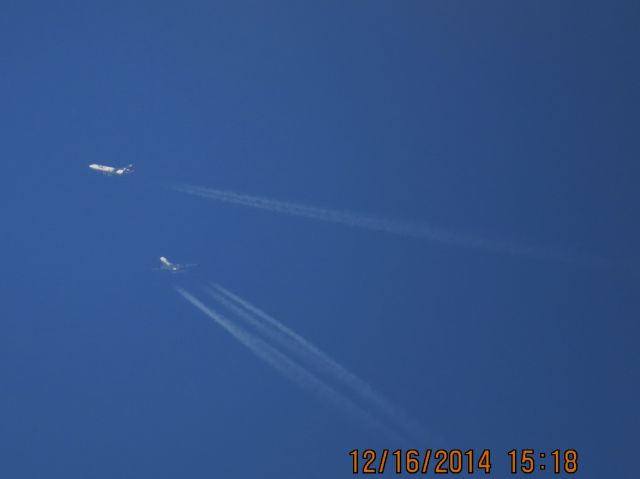 Boeing MD-11 (N608FE) - FedEx flight 900 from MEM to SEA over Southeastern Kansas at 36,000 feet passing in front of a Atlas Air 747.