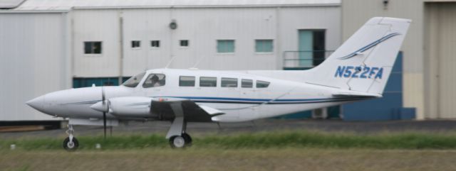 Cessna 402 (N522FA) - Dondi Pesquera at the controls of the N522FA Cessna 402C