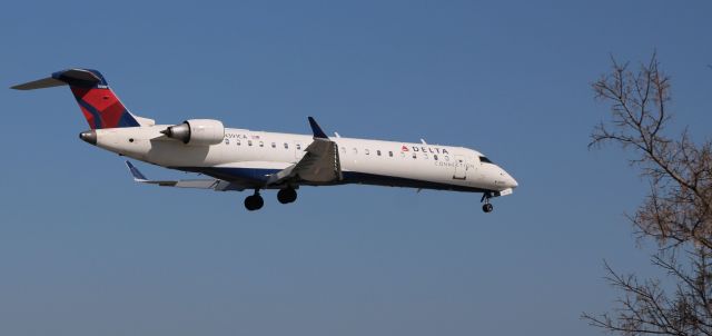 Canadair Regional Jet CRJ-700 (N391CA) - On final is this 2003 Delta Airlines Connection Canadair Regional Jet 701ER in the Spring of 2021.