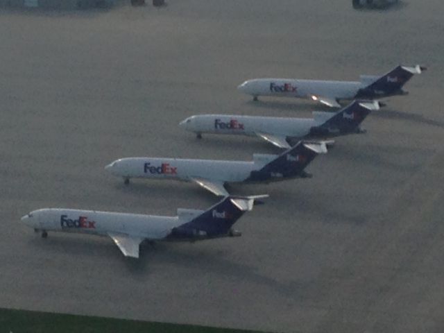 BOEING 727-200 — - Here are the last four Boeing 727-200Fs to exit service from FedEx. Sorry about the quality as this was taken from a departing plane! Pretty cool to see anyway. :)