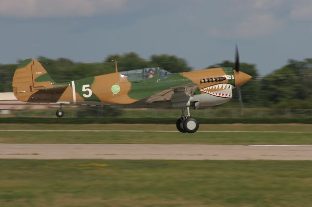 CURTISS Warhawk — - Curtis P-40 Departing Runway 18 EAA Oshkosh