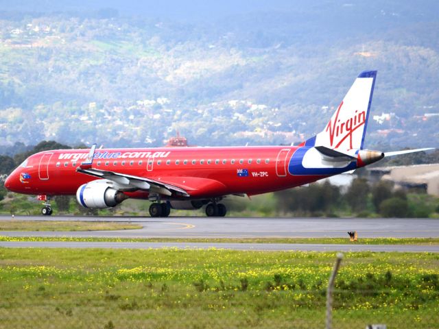 Embraer ERJ-190 (VH-ZPC) - Rolling for take off on runway 05. Thursday 12th July 2012.