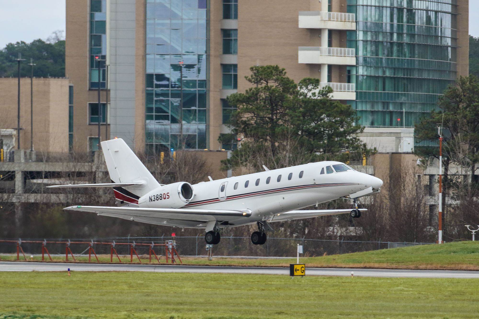 Cessna Citation Sovereign (N388QS) - This is a photo of a Cessna 680 departing Atlanta's PDK executive airport. I shot this with a Canon 100-400 IS II lens. The camera and lens settings were 312mm, 1/2000 shutter, F5.6 ISO 320. I really appreciate POSITIVE VOTES & POSITIVE COMMENTS. Please check out my other aircraft photography. Questions about this photo can be sent to Info@FlewShots.com