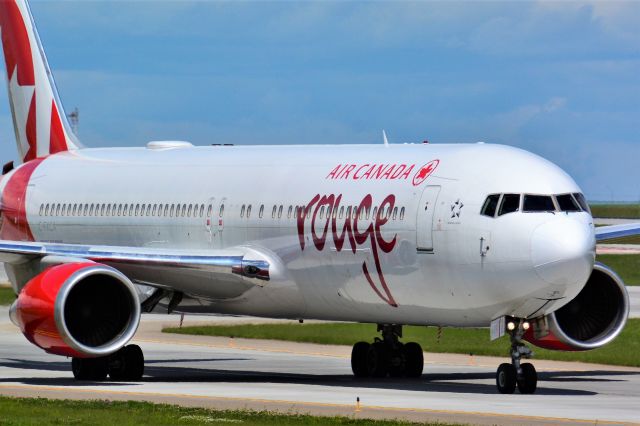 BOEING 767-300 (C-FXCA) - Air Canada Rouge Boeing 767-375(ER) arriving at YYC on July 1.