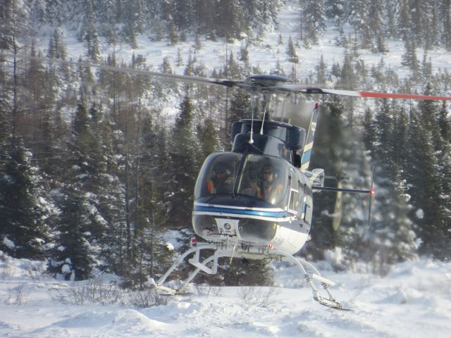 Bell 407 (C-GKWH) - C-GKWH, a CFLCO Bell 407 landing for fuel on its monthly snow measurement site visit. Poste-Montagnais, Québec - November 2012