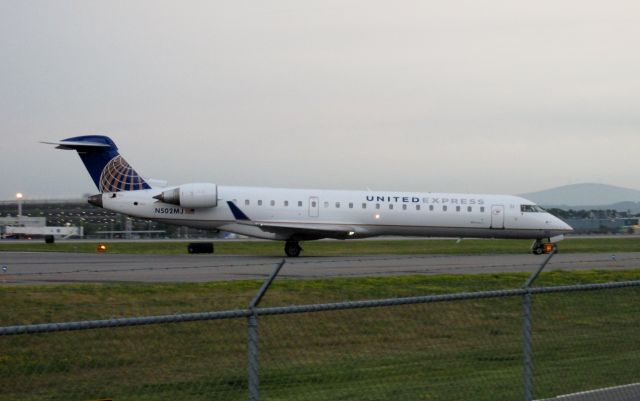 Canadair Regional Jet CRJ-700 (N502MJ) - United CRJ taxiing for departure runway 17 on July 3, 2014