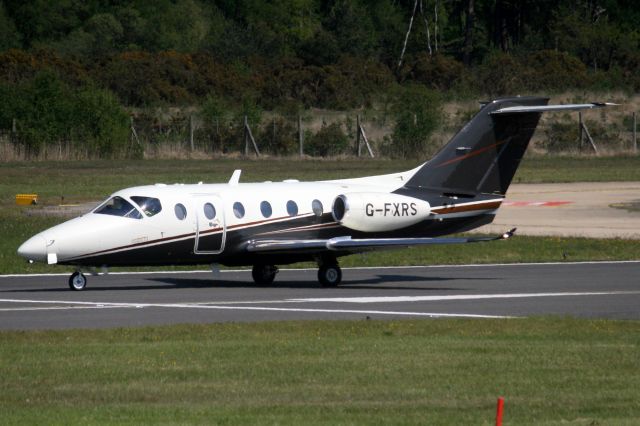 Beechcraft Beechjet (G-FXRS) - FlairJet Beechjet 400XT backtracking to depart rwy 06 on 15-May-19 heading for LSGG as FLJ54.