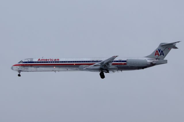 McDonnell Douglas MD-82 (N499AA) - "American 140" on short final for 33L. Less than 2 hours later, while boarding for the return flight to Dallas, this aircraft would be involved in a collision with ground equipment.