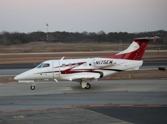 Embraer Phenom 100 (N175EW) - Taxiing to ramp at PDK on 02/16/2011