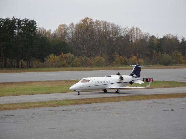 N814GF — - Learjet checking thrust reversers during taxi.