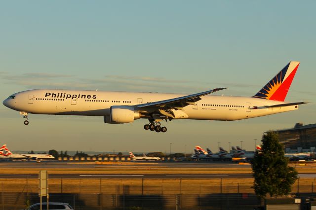 BOEING 777-300ER (RP-C7782) - PR720 landing on Heathrows runway 09L at 20:42 on Monday 02/07/18, catching the last golden rays of sunlight