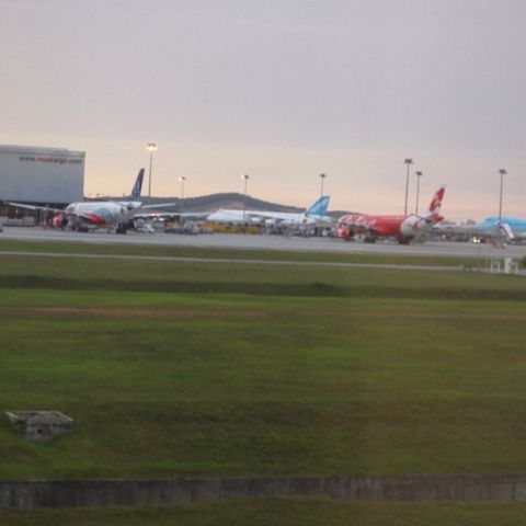 Airbus A330-300 (9M-XXF) - Antonov 124 in the background