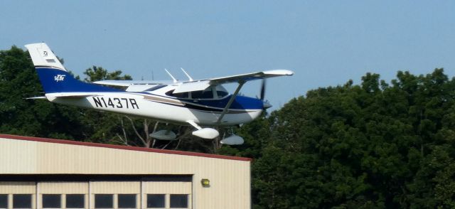 CESSNA T182 Turbo Skylane (N1437R) - About to touch down is this 2004 Cessna T182 Turbo Skylane in the Summer of 2023.