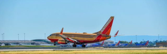 Boeing 737-700 (N714CB) - Touching down on 16L, KSAN-KSMF.