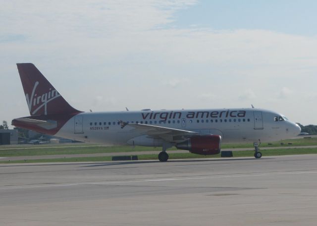 Airbus A319 (N528VA) - Taxiing in after landing at Orlando Sanford.