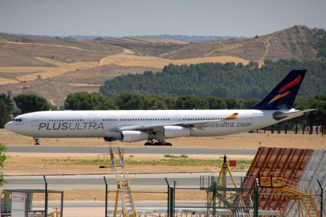 Airbus A340-300 (EC-NBU) - Taxiing to Gate S25 on 15-Aug-19 operating flight PUE302 from SPJC.