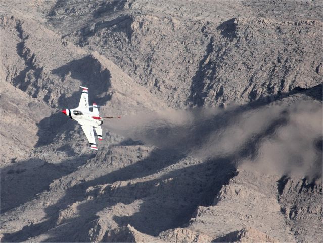 Lockheed F-16 Fighting Falcon — - Thunderbirds F-16 climbs away from the Nevada mountains during "Aviation Nation 2012" at Nellis AFB