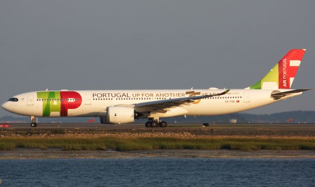 Airbus A330-900 (CS-TUD) - TAP A339 with 'Up for another 75 years' markings on the left side of the aircraft departing BOS on 8/11/21.