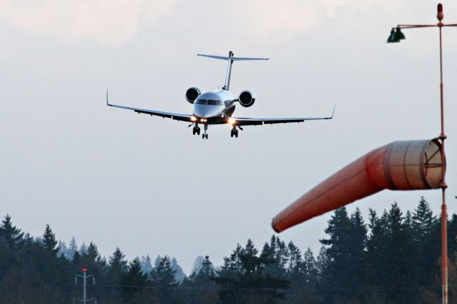 Canadair Challenger (N115WF) - Not sure who was on this flight to KHIO, but he drove off in one spendy black Ferrari coupe!    This photo was taken on final approach, KHIO tower cancelled an approved C172 clearance for take off on a cross runway. Not sure why