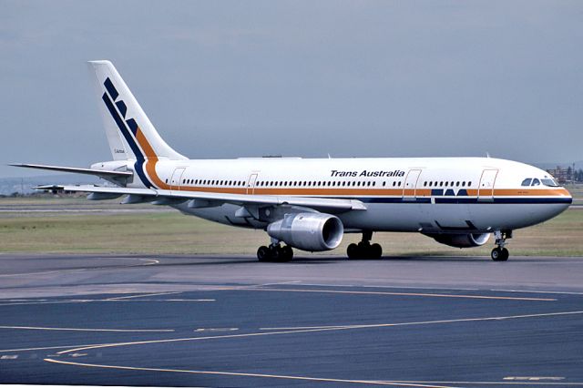 HARMON (2) Rocket (VH-TAB) - TRANS AUSTRALIA AILINES - AIRBUS A300-B4-203 - REG : VH-TAB (CN 151) - KINGSFORD SMITH SYDNEY NSW. AUSTRALIA - YSSY 17/3/1982 35MM SLIDE CONVERSION USING A LIGHTBOX AND A NIKON CAMERA IN THE MACRO MODE