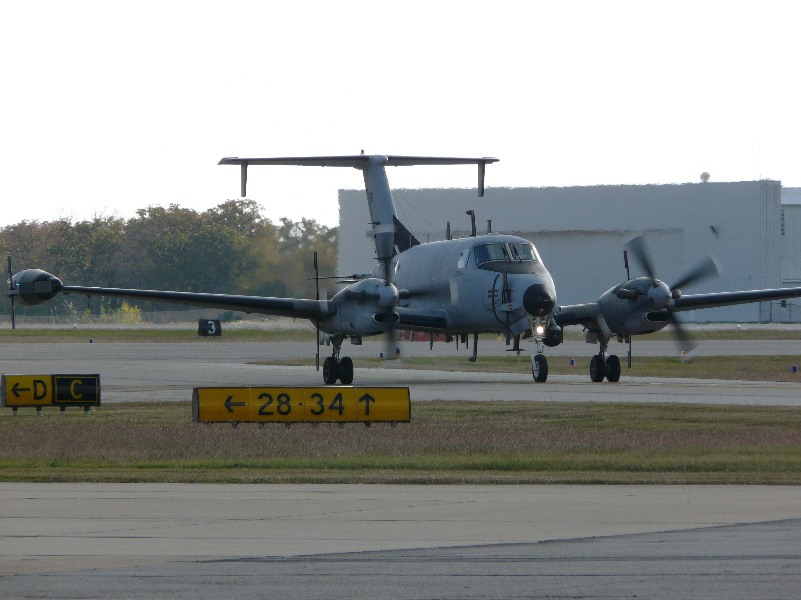 — — - This RC-12 SIGNET aircraft was spotted at College Station, TX. Sorry for the poor shot but here's the link to the info: a rel=nofollow href=http://defensetech.org/2011/02/08/first-rc-12x-sigint-spy-planes-making-their-way-downrange/http://defensetech.org/2011/02/08/first-rc-12x-sigint-spy-planes-making-their-way-downrange//a