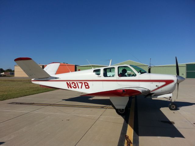 Beechcraft 35 Bonanza (N317B) - Kickapoo Downtown standing on ramp. Ready to taxi.