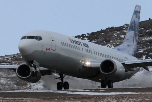 Piper Cheyenne 2 (C-FFNC) - First Air  737-400 taking off from Iqaluit