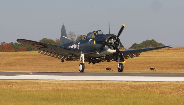 Douglas A-24 Dauntless (NL82GA) - The Commemorative Air Force's 1944 model Douglas SBD-5 Dauntless arriving at Folsom Field, Cullman Regional Airport, AL for the 2022 Cullman Veteran's Day Celebration - afternoon of October 4, 2022.