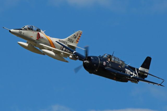 SINGAPORE TA-4 Super Skyhawk (N524CF) - One from my archives highlighting marine and naval aviation aviation history at its finest. I snapped this shot of a 1945 Grumman TBM-3E Avenger (N81865/85632) and a 1967 McDonnell Douglas TA-4J Skyhawk (N524CF/T83) during their demonstration at Thunder Over Michigan, Willow Run Airport, on 21 Aug 2016.