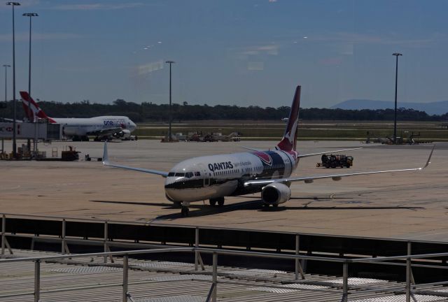 Boeing 737-800 (VH-ZXJ) - Headed to the Gate from the Business Lounge... as this taxied to the gate.