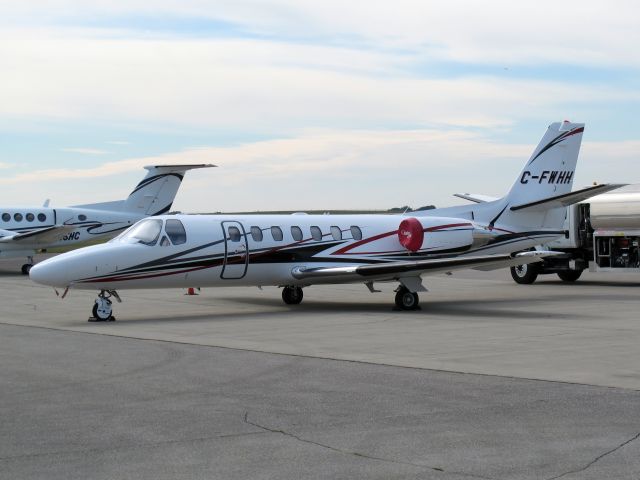 Cessna Citation V (C-FWHH) - A very nice Citation Ultra. Based at Calgary. Please note the nose wheel gravel kit. It turns the nose wheel before touch down.