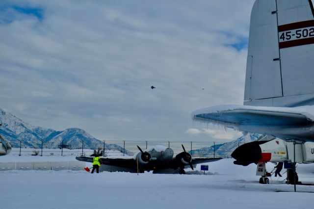 Lockheed F-35C — - F35s doing some Maneuver at Hill Air Force Base with C-45 Expeditor in foreground on display at Hill Aerospace Museum. 