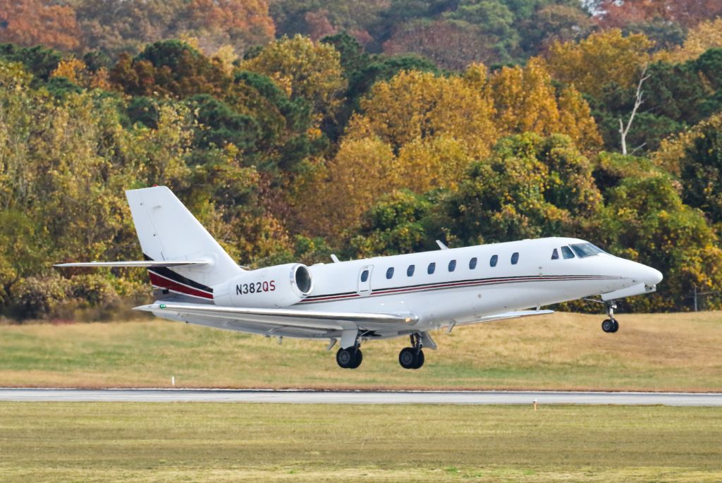 Cessna Citation Sovereign (N382QS) - N382QS is a 2008 Cessna Citation 680 seen here departing Atlanta's PDK executive airport. I shot this with a Canon 100-400mm IS II lens at the focal length of 300mm. Camera settings were 1/5300 shutter, F5, ISO 1000.  Please check out my other photography. Votes and positive comments are always appreciated. Questions about this photo can be sent to Info@FlewShots.com