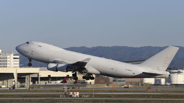 Boeing 747-400 (N406KZ) - Departing LAX on 25L