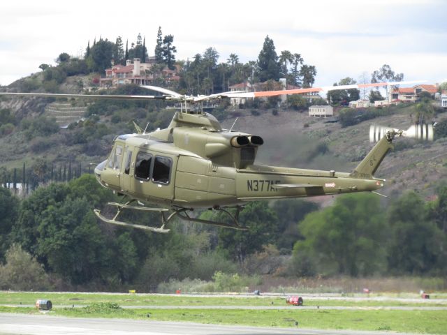 Bell 412 (N377AF) - Landing on southwest pad