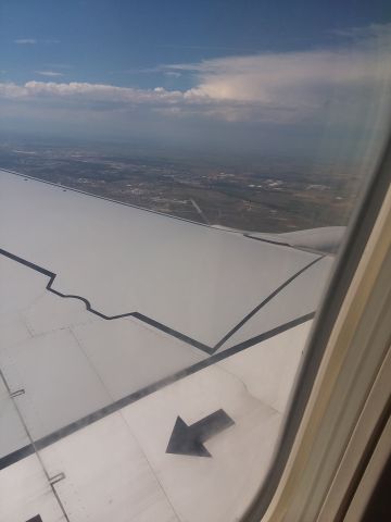 — — - From Southwest flight 515 on approach into KDEN