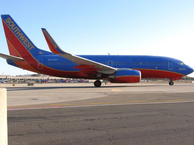 Boeing 737-700 (N448WN) - Holding short of RWY 19R