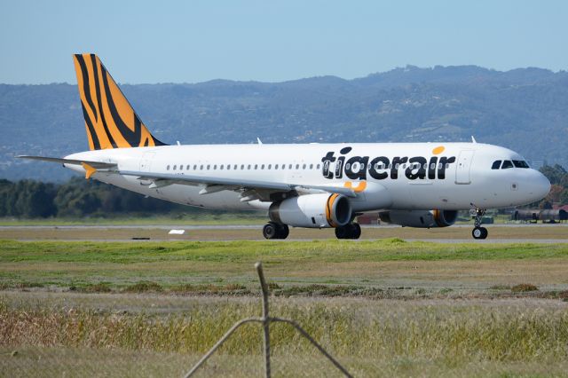 Airbus A320 (VH-VND) - On taxiway heading for take-off on runway 05. Thursday, 8th May 2014.